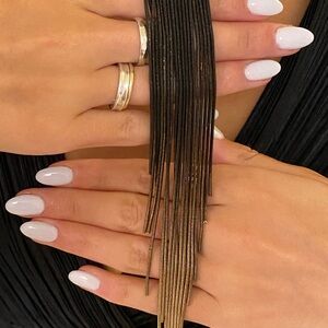 Elegant Gold and Black Fringe Necklace